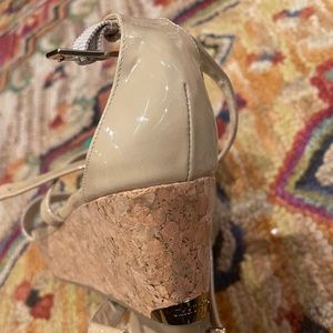 JIMMY CHOO
Portia 70 patent-leather wedge sandals new without box